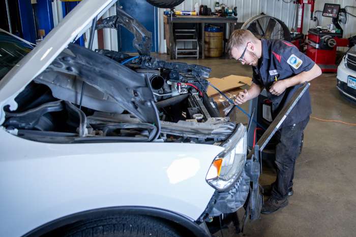 mechanic working on a vehicle in the fargo moorehead area